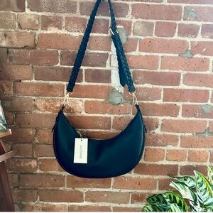 Jules Kae Zola, Vegan Hobo bag. Black |
New, with tags.